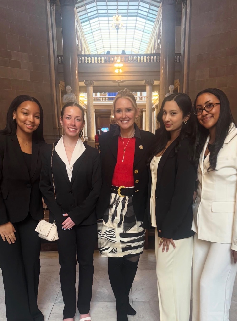 Suhina Singh with fellow advocates at the capitol